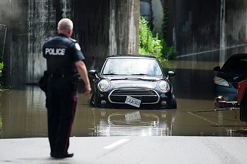 Emergency services respond to submerged vehicles